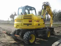 Услуги, аренда, заказ колесного экскаватора, фотография 3