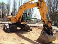 Услуги, аренда, заказ колесного экскаватора, фотография 2