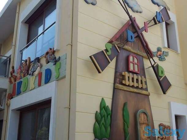 Оформление фасада объемными фигурами, фотография 6