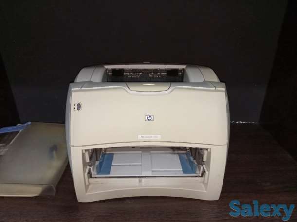Принтер HP 1000, фотография 1