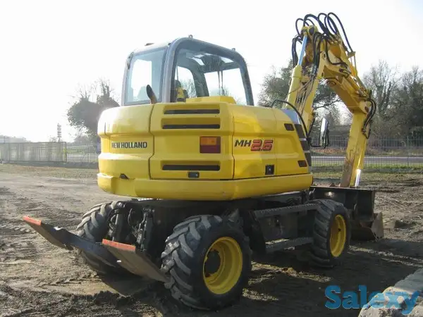 Услуги, аренда, заказ колесного экскаватора, фотография 3