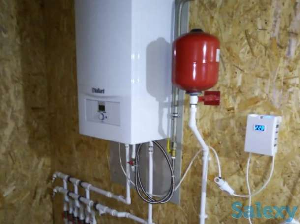 Сантехник, фотография 1