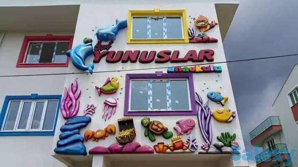 Оформление фасада объемными фигурами, фотография 10