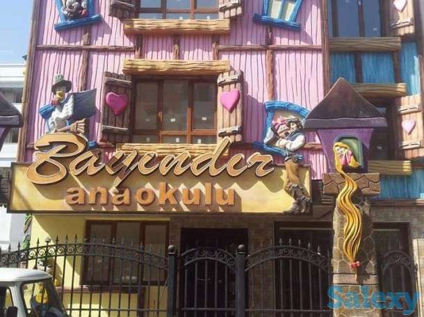 Оформление фасада объемными фигурами, фотография 13