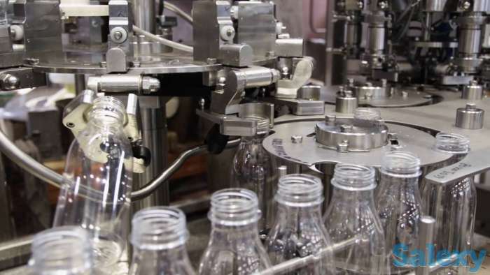 Линия розлива негазированной воды в ПЭТ тару объемом от 0,3 - 2,0 литра производительностью до 6000 бутылок в час, фотография 2