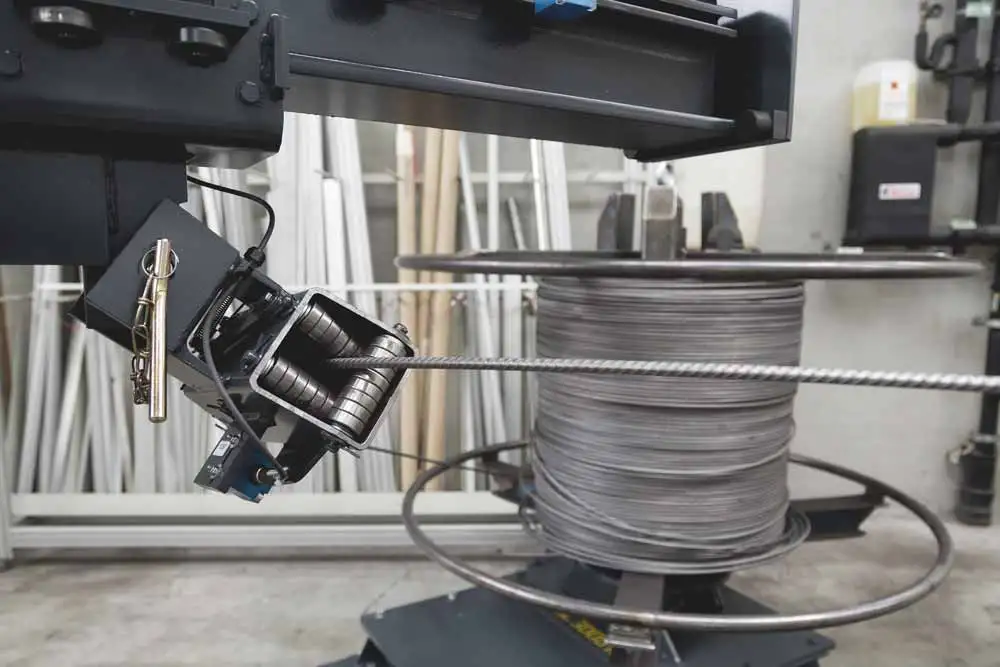 Размот, выпрямление арматуры, проволоки Издел.: арматура; круг стальной; круг чугунный..., фотография 1