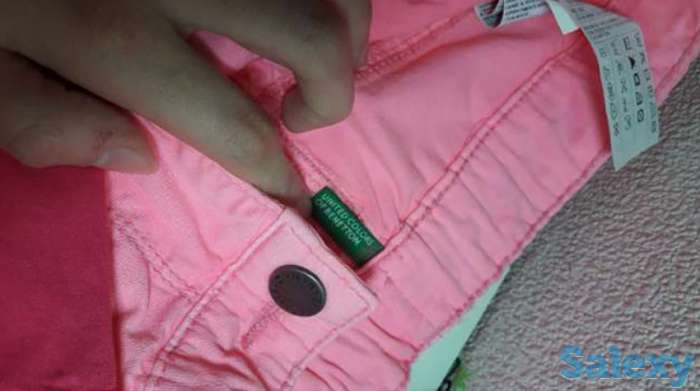 Новые не разу не одёванные брюки . Фирма UNITED COLORS OF BENETTON, фотография 1