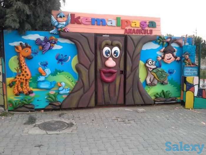 Оформление фасада объемными фигурами, фотография 3