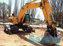 Услуги, аренда, заказ колесного экскаватора, фотография 2