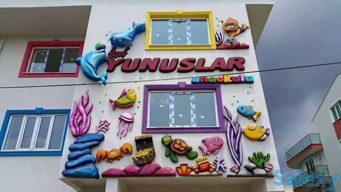 Оформление фасада объемными фигурами, фотография 10